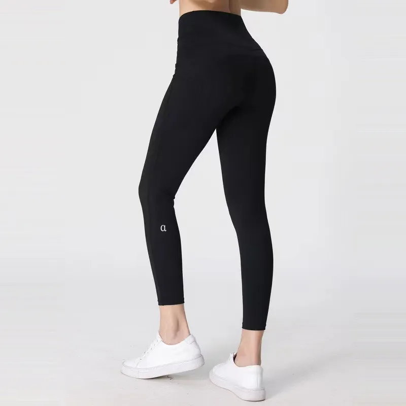 AL9507 Leggings para mujeres Pantalones de yoga noveno con bolsillos Fitness Legging suave de la cintura alta al elevador