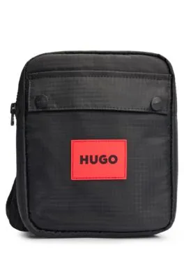 Bandolera para niños con etiqueta con logo roja