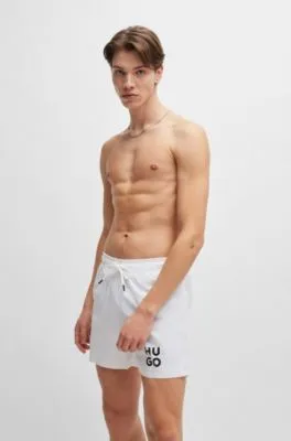 Bañador tipo shorts con forro integral y logo apilado