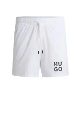Bañador tipo shorts con forro integral y logo apilado
