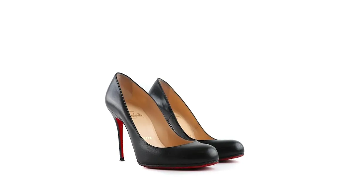 CHRISTIAN LOUBOUTIN Tacones T.UE 36.5 Cuero Negro 