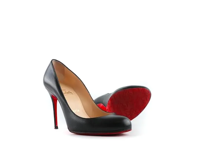 CHRISTIAN LOUBOUTIN Tacones T.UE 36.5 Cuero Negro 