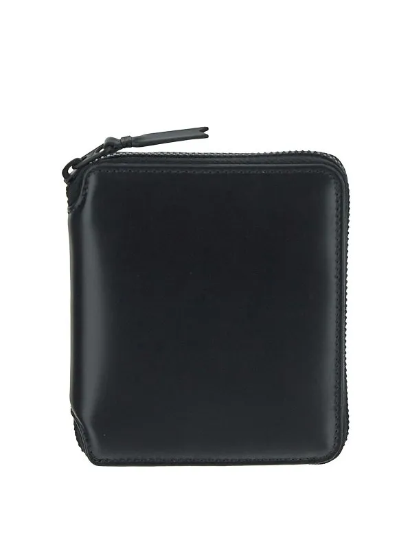 COMME DES GARCONS CARTERAS Y MONEDEROS  BEIS
