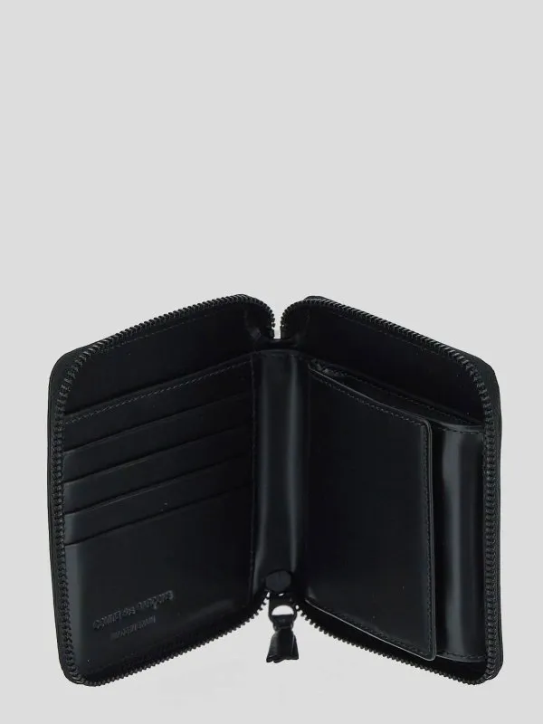 COMME DES GARCONS CARTERAS Y MONEDEROS  BEIS