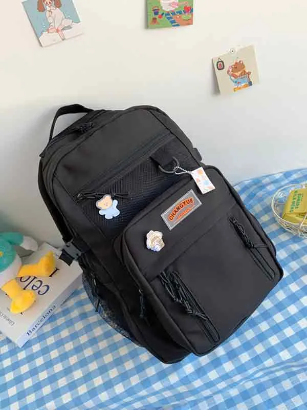Mochila informal con bolsillo de malla color block