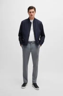 Pantalones regular fit de tejido panamá elástico jaspeado