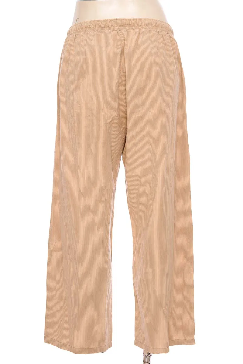 ROPA DEPORTIVA COLOR BEIGE  GEF