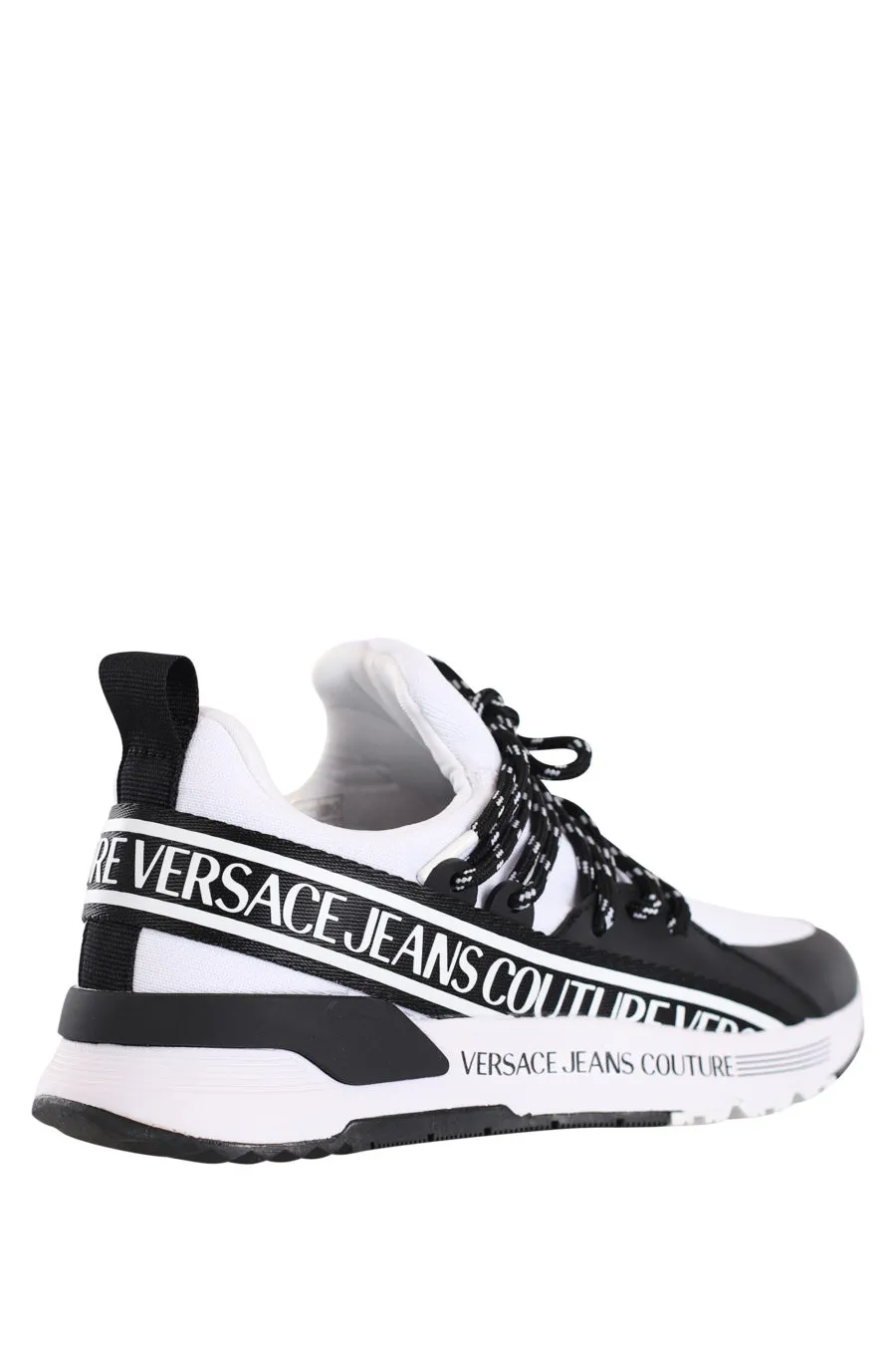 Zapatillas blancas con cordones cruzados y logo en cinta