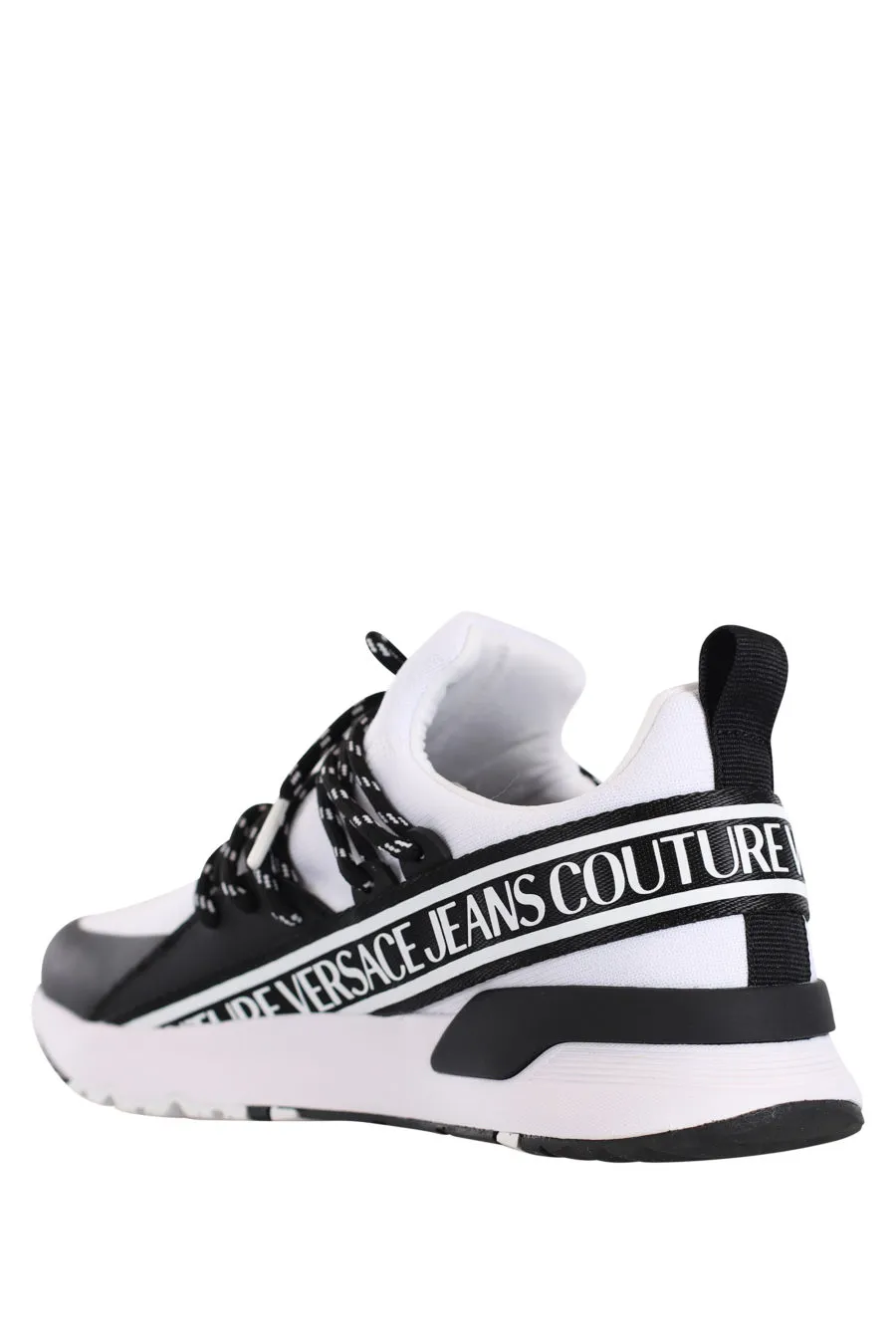 Zapatillas blancas con cordones cruzados y logo en cinta